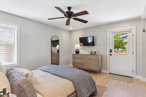 Bedroom featuring light wood-type flooring, recessed lighting, and a ceiling fan