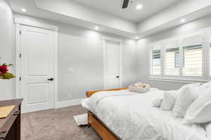 Bedroom with carpet, recessed lighting, and a ceiling fan