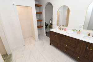 Bathroom with a sink and built in features