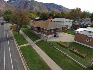 Aerial view of residential area with a mountainous background