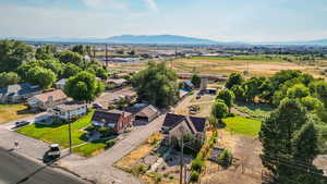 Aerial view of residential area featuring a mountain backdrop