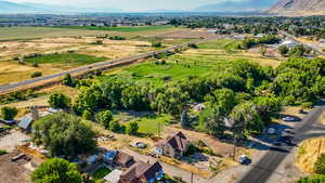 Aerial view of property's location with mountains and rural landscape