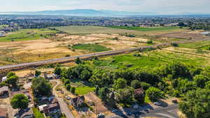 Aerial view of sparsely populated area featuring a mountainous background