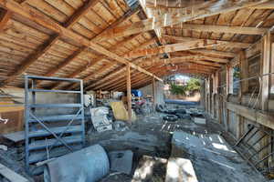 Miscellaneous room featuring vaulted ceiling and wood ceiling