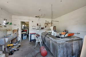Living room with unfinished concrete floors
