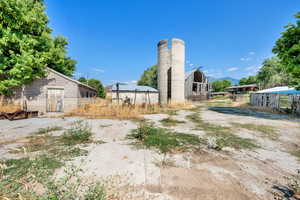 View of yard with an outbuilding and a mountain view