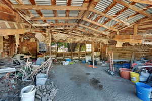 Miscellaneous room with vaulted ceiling