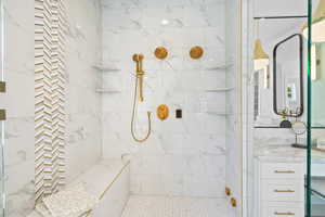 Bathroom with tiled shower
