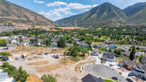 Mountain view featuring nearby suburban area