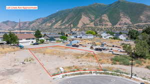 View of mountain backdrop with nearby suburban area