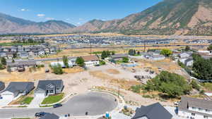 Aerial view of residential area with a mountainous background