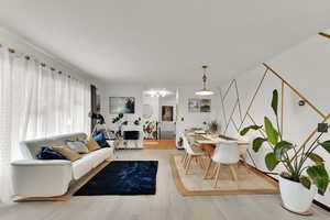 Living room featuring wood finished floors