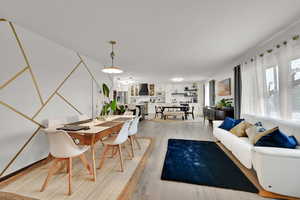 Dining space featuring light wood-style floors