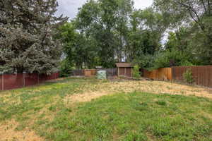View of fully fenced private backyard