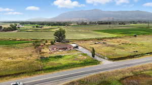 Overview of rural landscape with a mountainous background