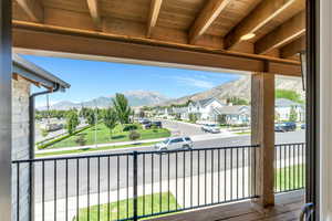 Balcony with a mountain view and a residential view