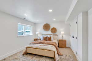 Bedroom featuring recessed lighting and carpet