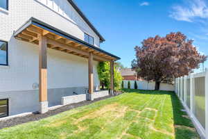 View of fenced backyard