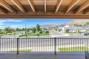 Deck with a mountain view and a residential view