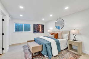 Bedroom with carpet floors and recessed lighting