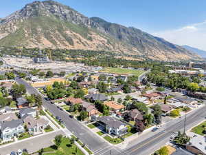 View of property location featuring a mountainous background and nearby suburban area