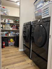Laundry room featuring washer and clothes dryer.