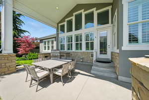 View of patio / terrace featuring outdoor dining space and exterior kitchen