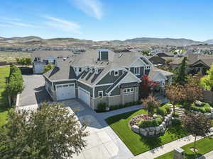 Aerial perspective of suburban area with a mountain backdrop