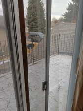 Doorway featuring healthy amount of natural light