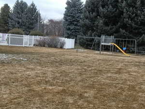View of yard featuring view of wooded area