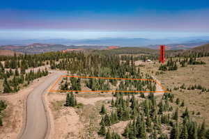 View of property location with mountains and property parcel outlined