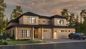 View of front facade with a garage, concrete driveway, stone siding, and a shingled roof