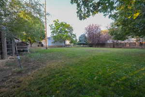 View of fenced backyard
