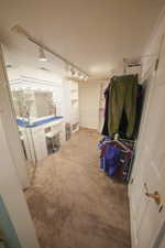 Bathroom featuring rail lighting