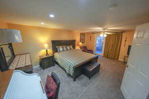 Bedroom featuring carpet floors, recessed lighting, and a ceiling fan