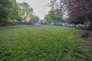 View of fenced backyard