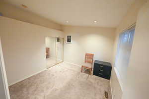 Unfurnished bedroom featuring carpet floors and recessed lighting