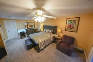 Bedroom featuring carpet flooring, recessed lighting, and ceiling fan