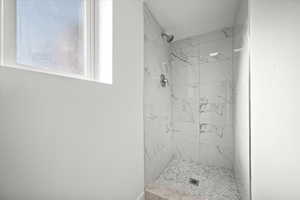 Full bath with tiled shower