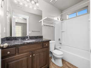 Full bathroom with vanity and  shower combination
