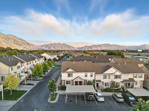 View of mountain background featuring nearby suburban area