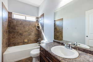 Full bathroom featuring vanity and shower / tub combination