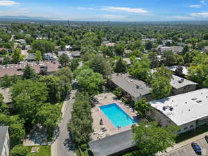 Aerial view of a pool area and mountains
