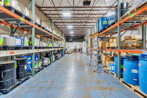 Garage featuring metal wall