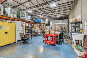 Garage featuring metal wall