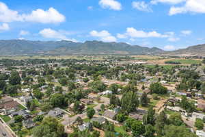 Aerial view of residential area featuring a mountain backdrop