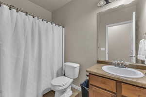 Bathroom with vanity and a shower with curtain