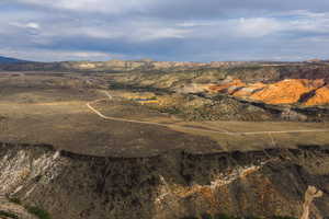 Aerial overview of property's location featuring a mountainous background
