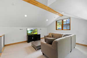 Living room featuring recessed lighting and light colored carpet