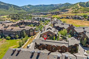 Aerial view of residential area with mountains